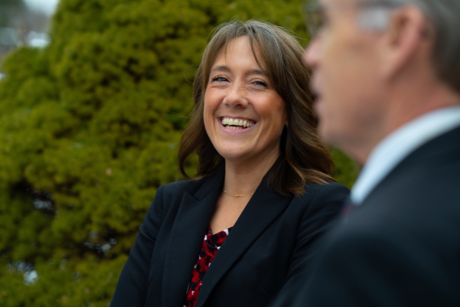 Jody Angellotti, Senior Financial Consultant at Curley Wealth Management, laughs at a joke